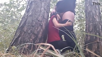 Lesbian Girls Have Steamy Sex Under A Tree To Stay Dry