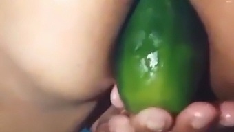 Stepmother Shows Off Her Open Ass By Using A Large Cucumber