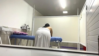 A Plump Patient Anesthetized With Oil In A Medical Office, Captured On Camera
